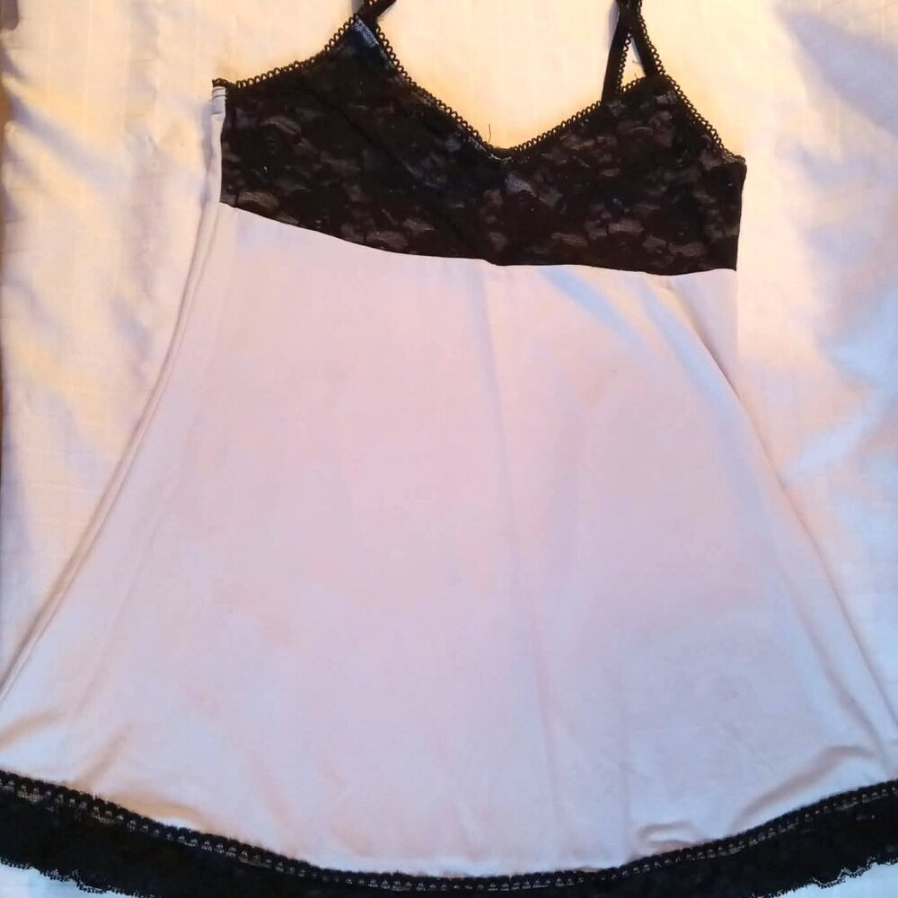 Pretty vintage white camisole with black lace at the chest and bottom